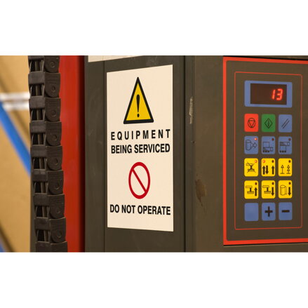 MAGNETIC LABEL EQUIPMENT BEING SERVICED